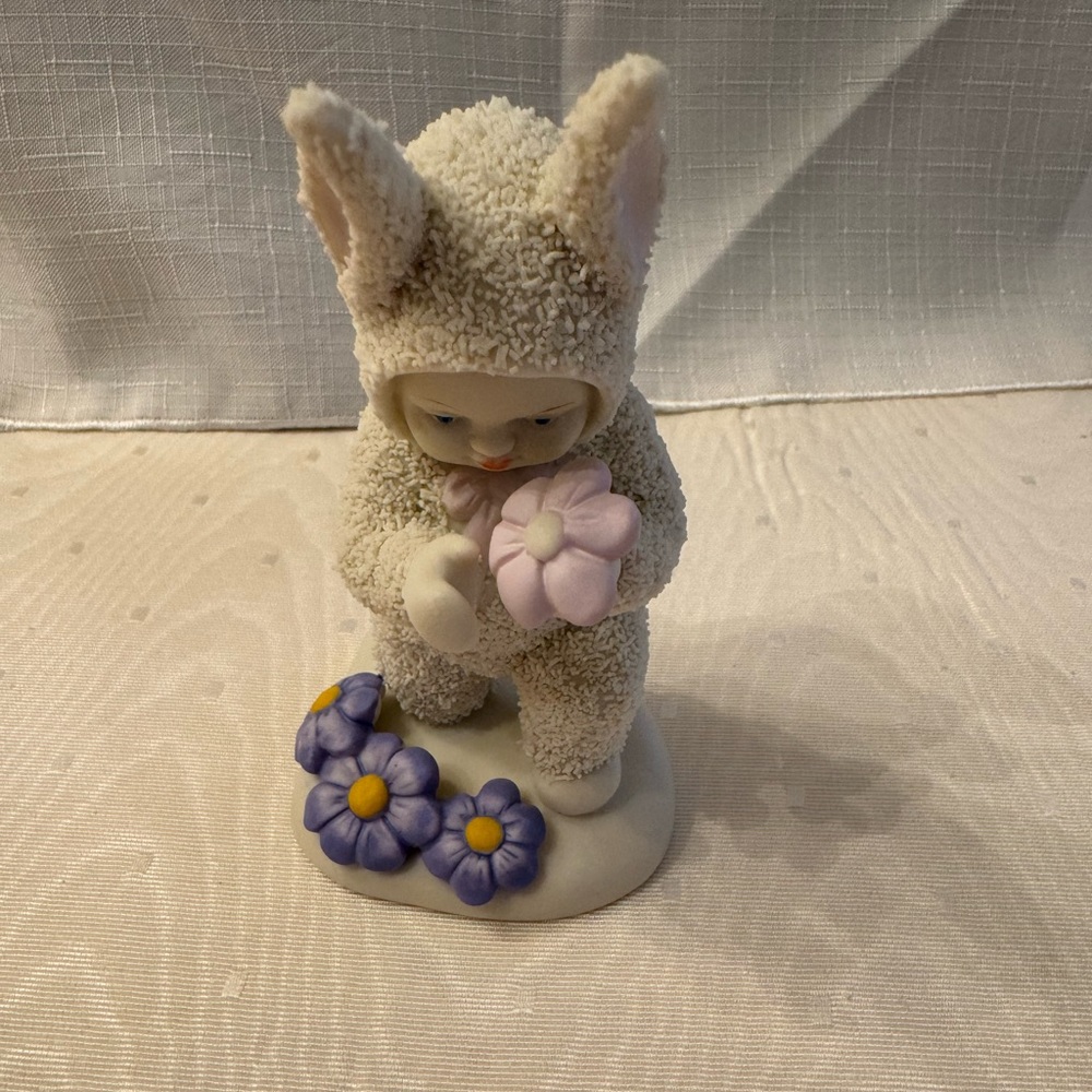 Department 56 snowbaby with purple flowers